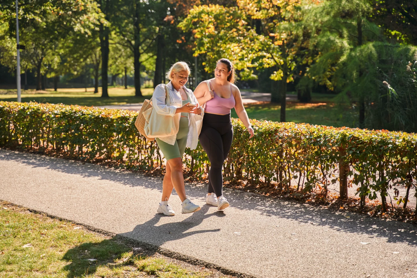 Women walking outdoors with chub rub